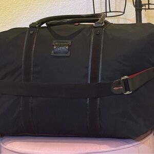 This CL WEEKENDER BAG is in EXCELLENT CONDITION & HAS 0 Call Outs…!!!